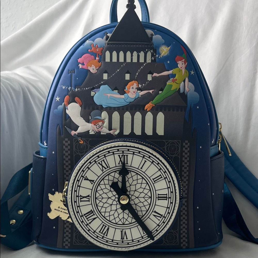 Loungefly  Peter Pan Backpack with‎ glow in the dark clock.